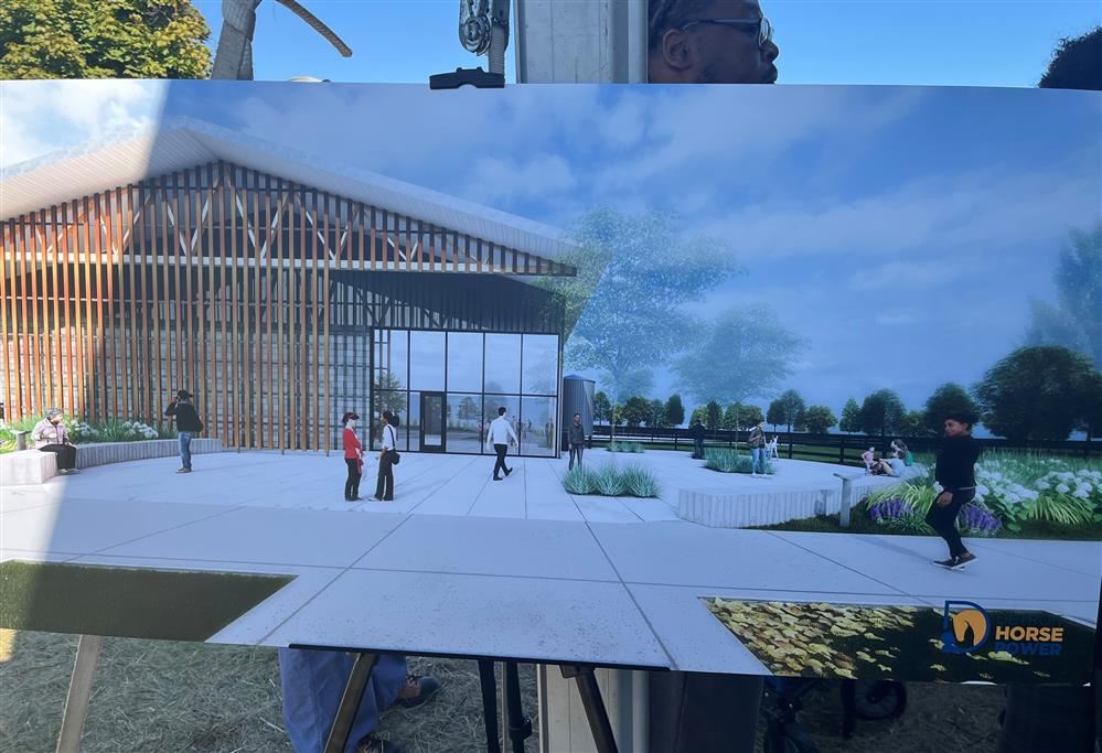  Photograph of an artist rendering of equestrian center